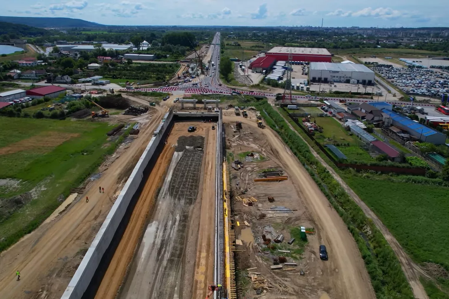 VIDEO Cum arată acum viitorul nod rutier Bascov, de la capătul autostrăzii A1 spre Pitești / Lucrările sunt în curs. Cum va arăta la final VIDEO Cum arată acum viitorul nod rutier Bascov, de la capătul autostrăzii A1 spre Pitești / Lucrările sunt în curs. Cum va arăta la final